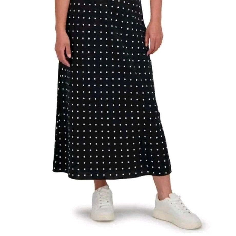 Black polka dot maxi slip skirt for women by Aeropostale, featuring a flowing design and comfortable waistband.