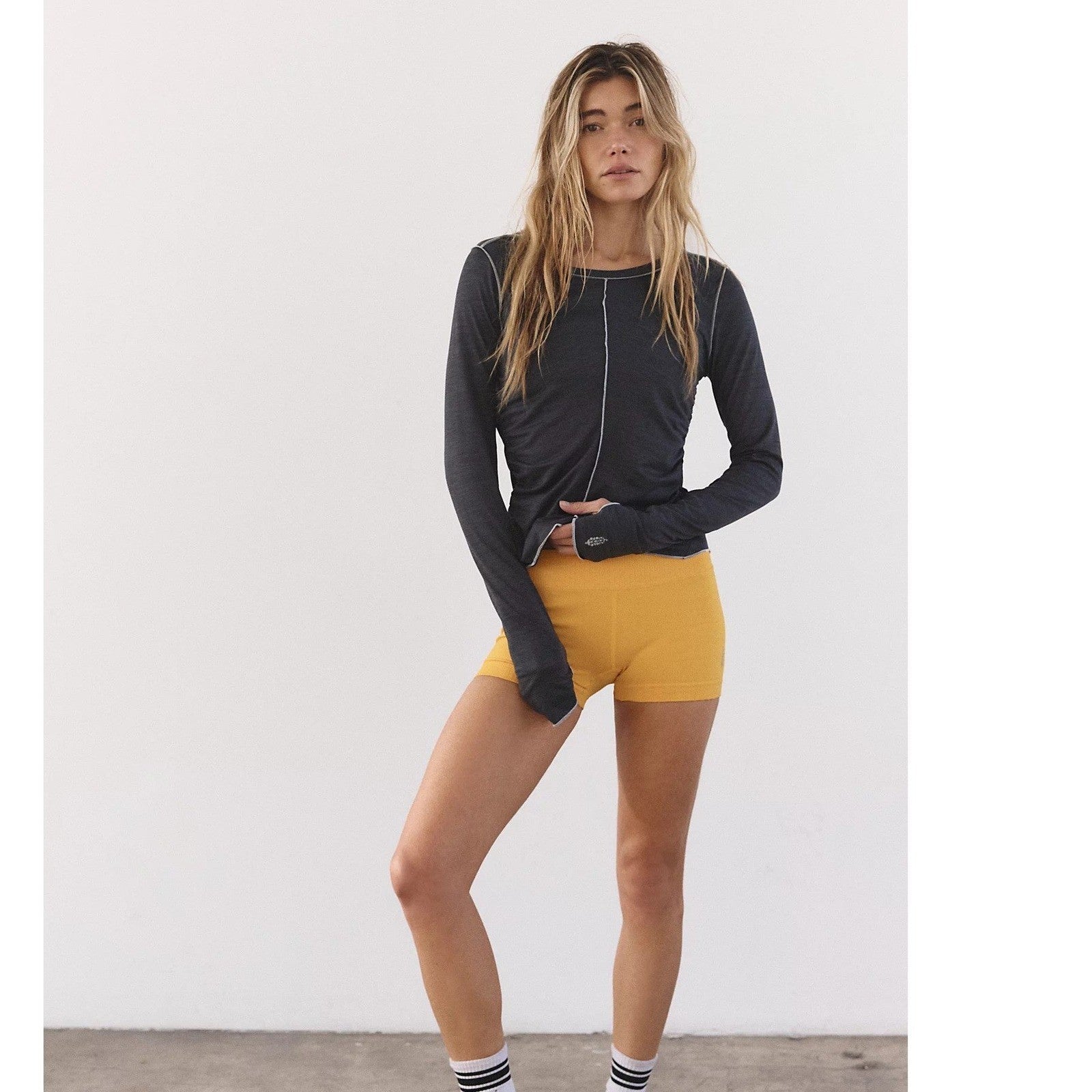Women's Free People long sleeve T-shirt in XS, featuring a relaxed fit and soft fabric, perfect for casual layering.