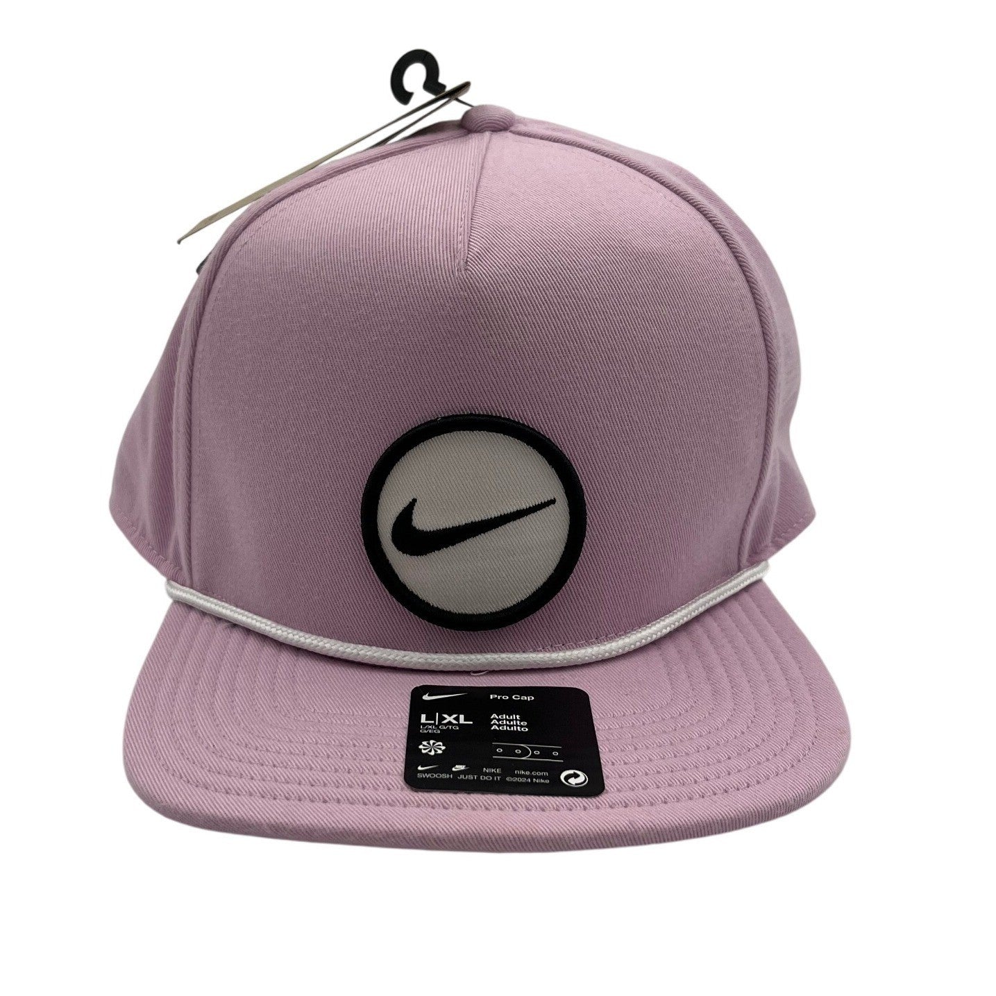 Pink Nike Pro Stretch Fit Cap in L/XL size, featuring a comfortable, flexible design and Nike branding.