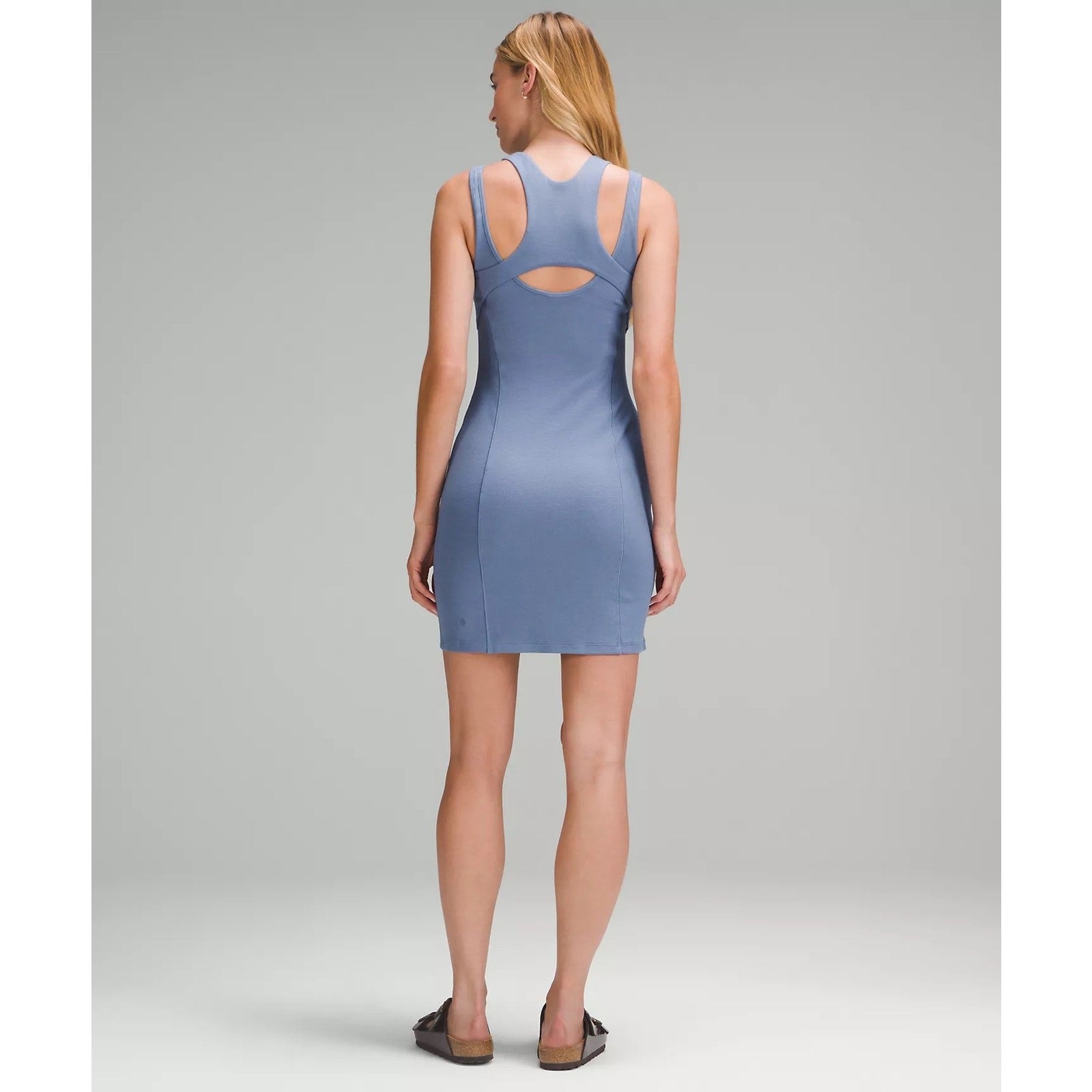 Lululemon ribbed cotton-modal cut-out dress for women, size 4, featuring a fitted design with stylish cut-outs and ribbed texture.