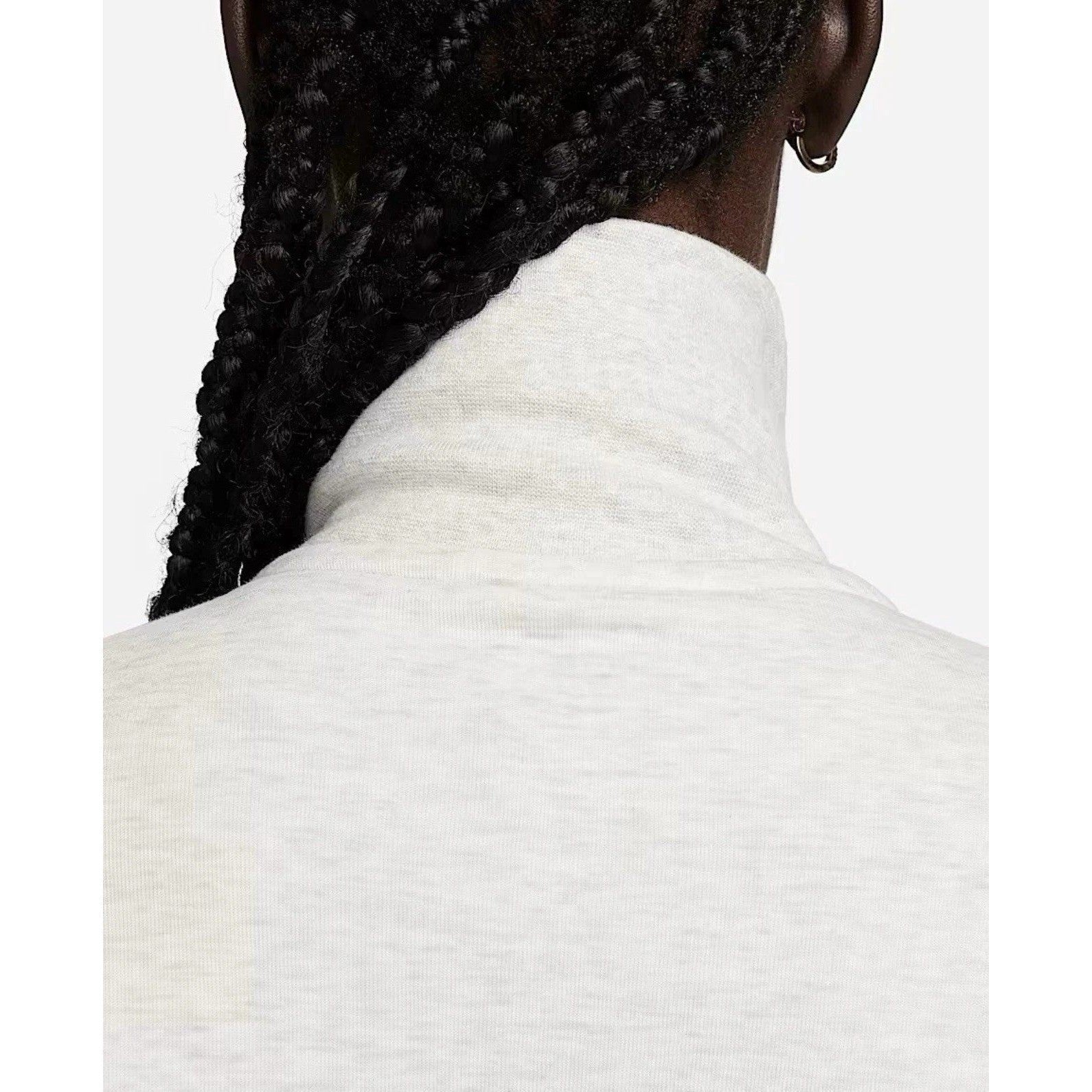 Nike Tech Fleece Windrunner jumpsuit in grey with Nike logo, featuring a sleek, fitted design and full-length sleeves.