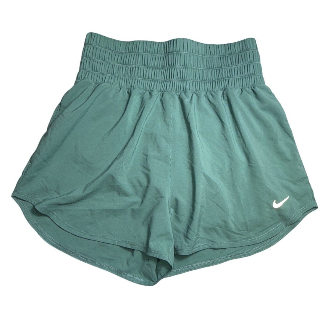 Nike Dri-FIT high-waist women's training shorts in medium, featuring a smooth fabric and athletic fit for active wear.
