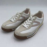 Pink Tretorn women's sneakers, 7-inch size, stylish and comfortable casual footwear, shown from a side view.