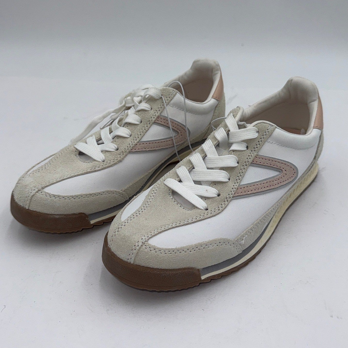 Pink Tretorn women's sneakers, 7-inch size, stylish and comfortable casual footwear, shown from a side view.