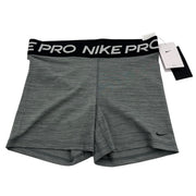 Nike Pro 365 women's gray and black training shorts with a 5-inch inseam, size large, shown on a model.
