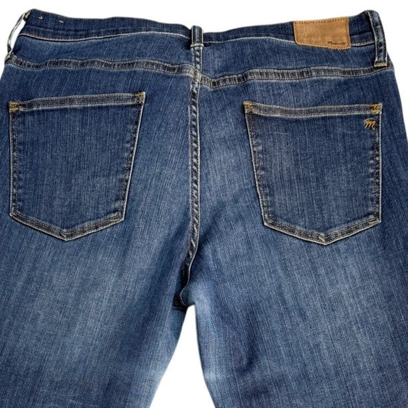 Madewell high riser skinny jeans for women, size 32, in great condition, showing the denim fabric and classic fit.