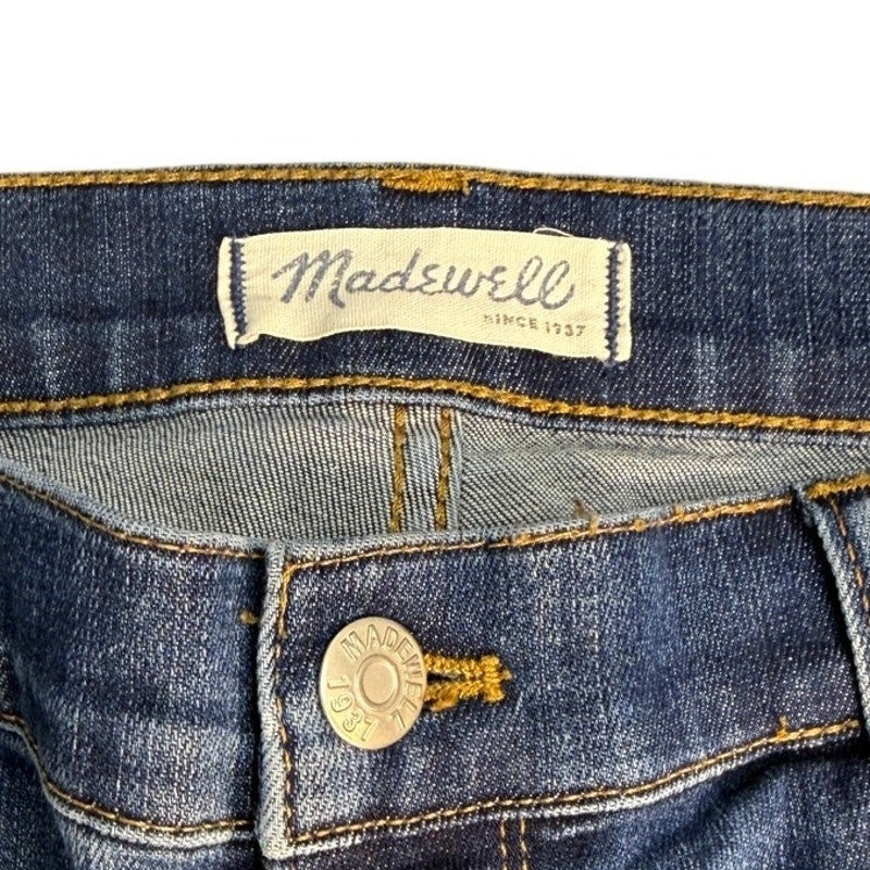Madewell high riser skinny jeans for women, size 32, in great condition, styled on a hanger showing the denim fabric and fit.