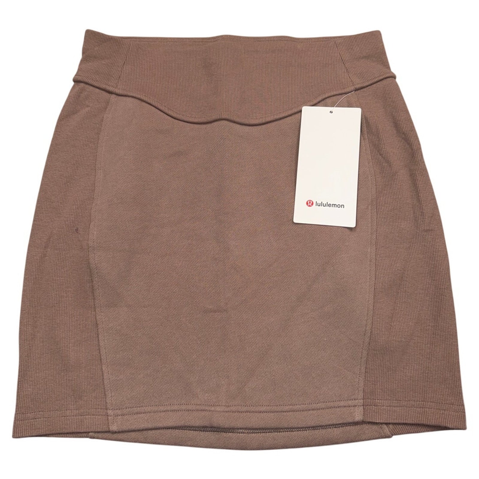 Lululemon Scuba high-rise mini skirt in taupetastic brown for women, size large, showing the fitted waistband and smooth fabric.