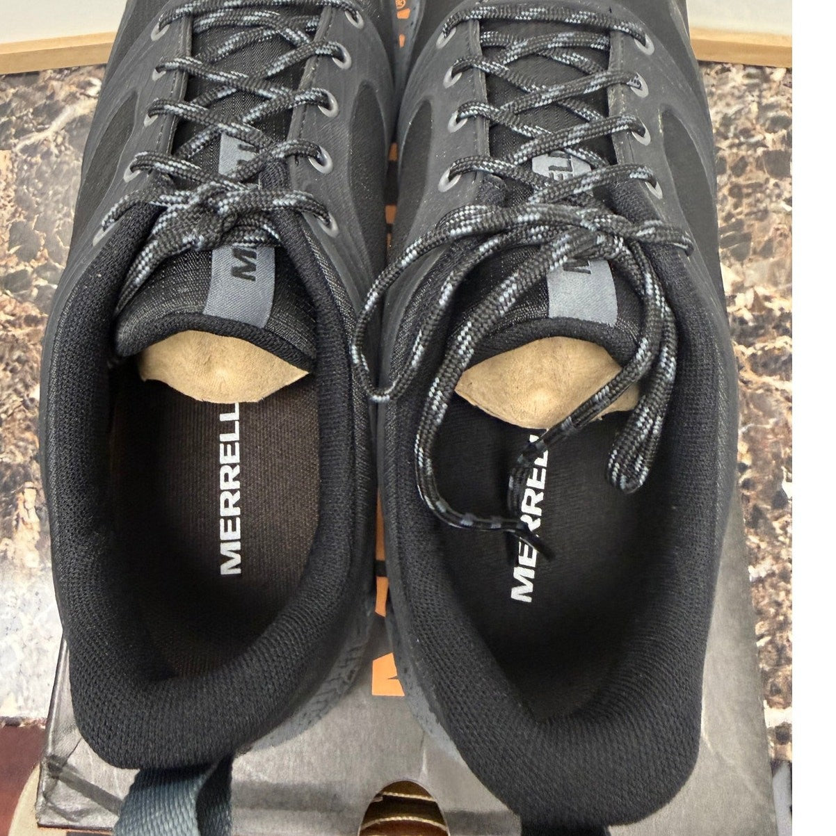 Black Merrell Altalight trail running shoes for men, size 11 EU45, featuring durable outsole and supportive design for hiking.