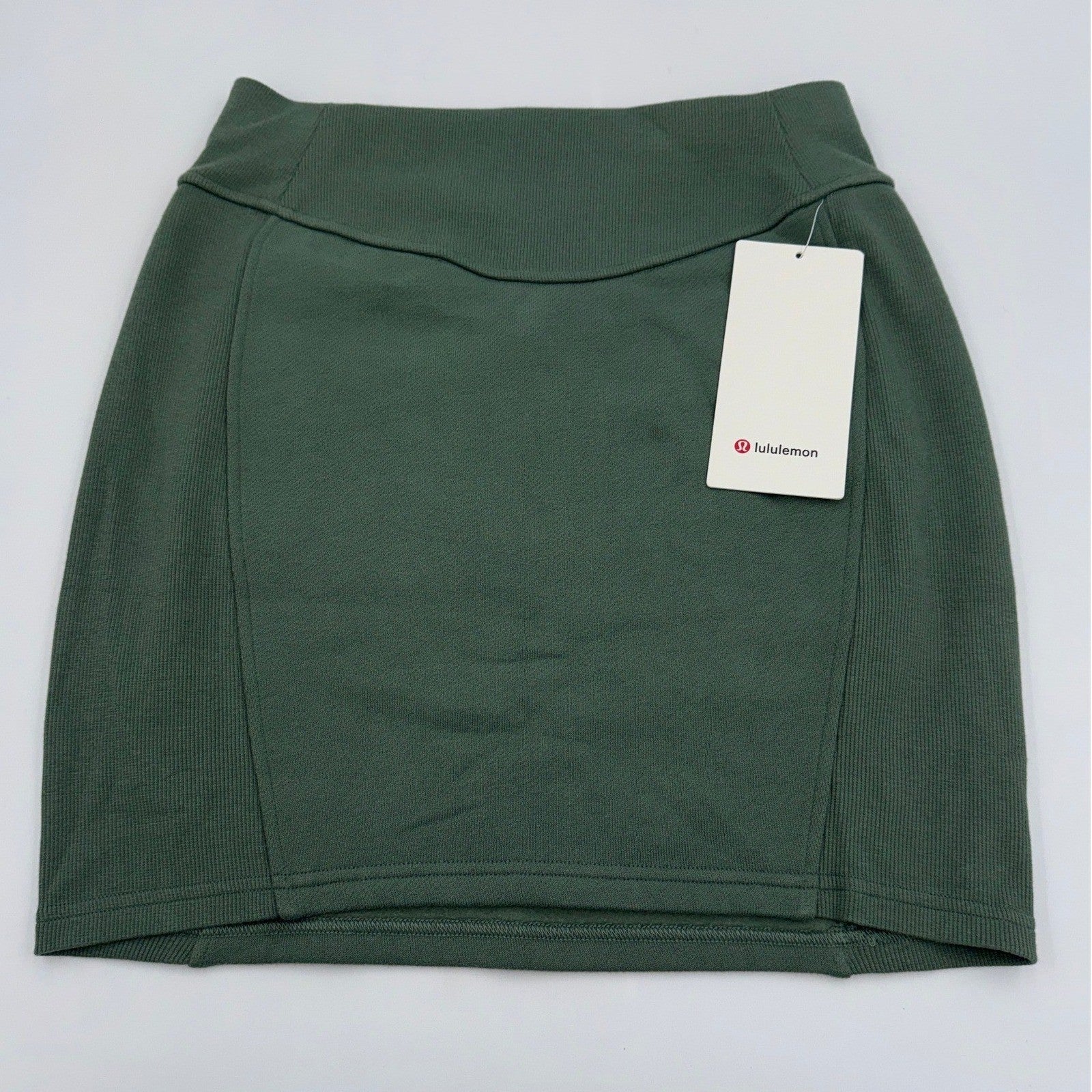 Lululemon NWT high-rise stretch scuba HR mini skirt for women in small size, featuring a sleek, fitted design ideal for athleisure.