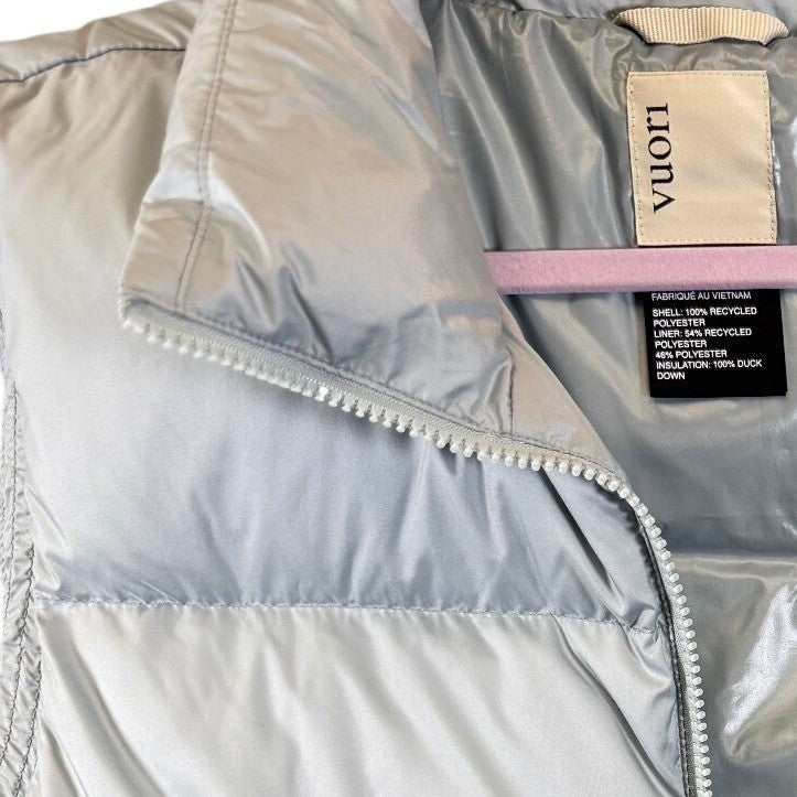 Vuori Women's Hillside Down Vest with 100% duck down insulation, featuring a sleek, lightweight design and quilted exterior.