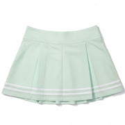 Women's CALIA Truelight golf skirt in mint Ceylon green, 15-inch pleated design, size 4, shown on a model.