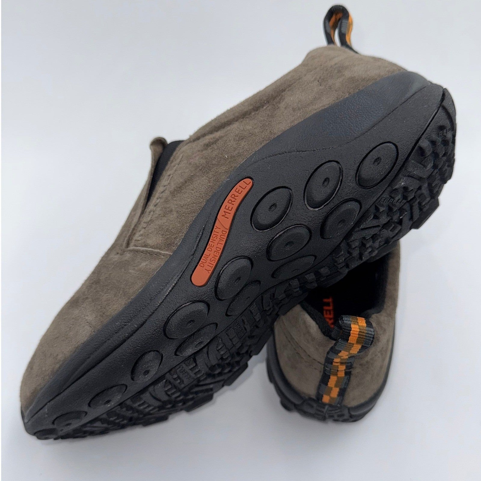 Men's Merrell Jungle Moc Gunsmoke running shoes, size 9, with textured suede uppers and slip-on design, on neutral background.