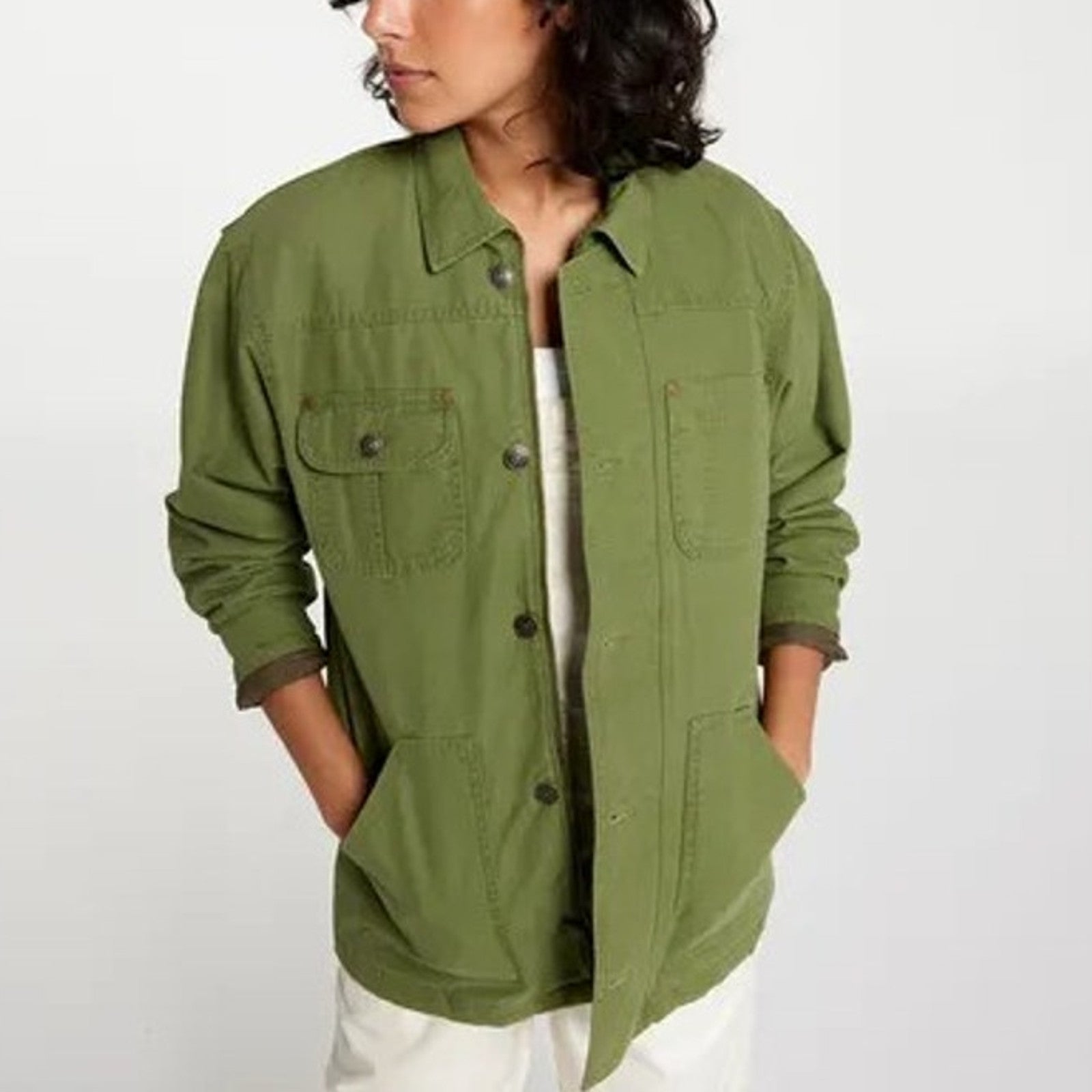 Alpine Design quilted lined chore coat in lush olive, durable jacket with layered stitching and warm interior for outdoor wear.
