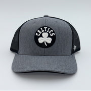 Gray and black NBA Boston Celtics '47 Brand trucker hat with mesh panels and snapback closure.