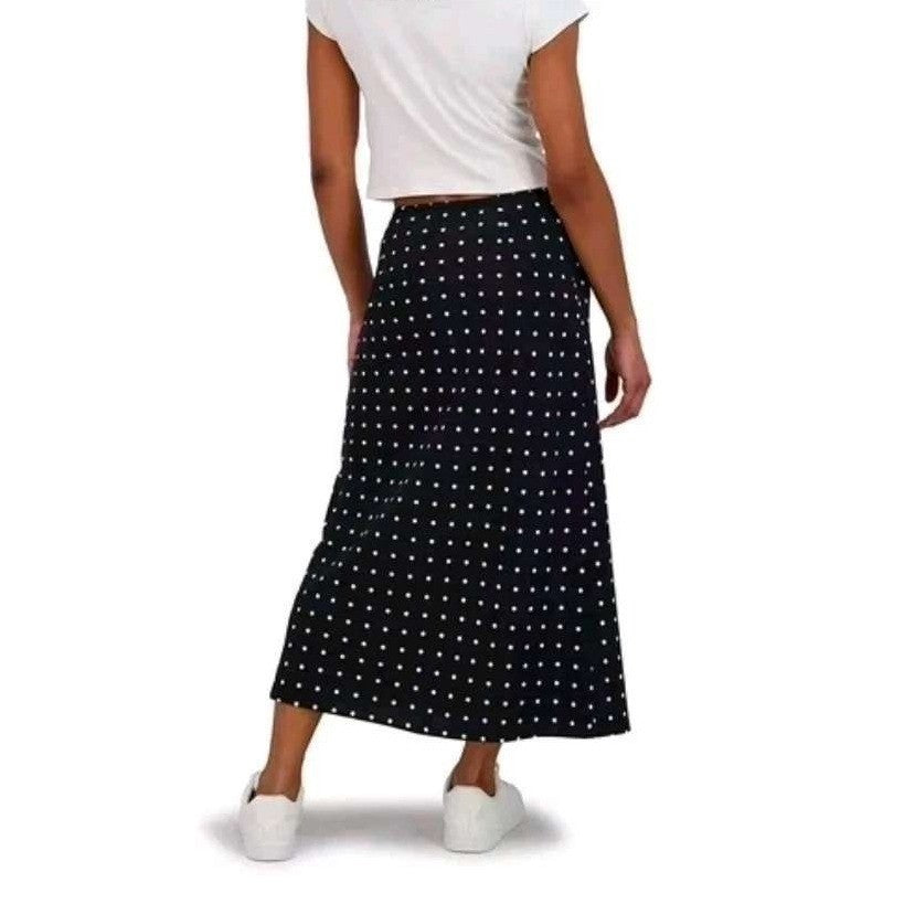 Black polka dot maxi slip skirt for women by Aeropostale, featuring a flowing design and comfortable waistband.