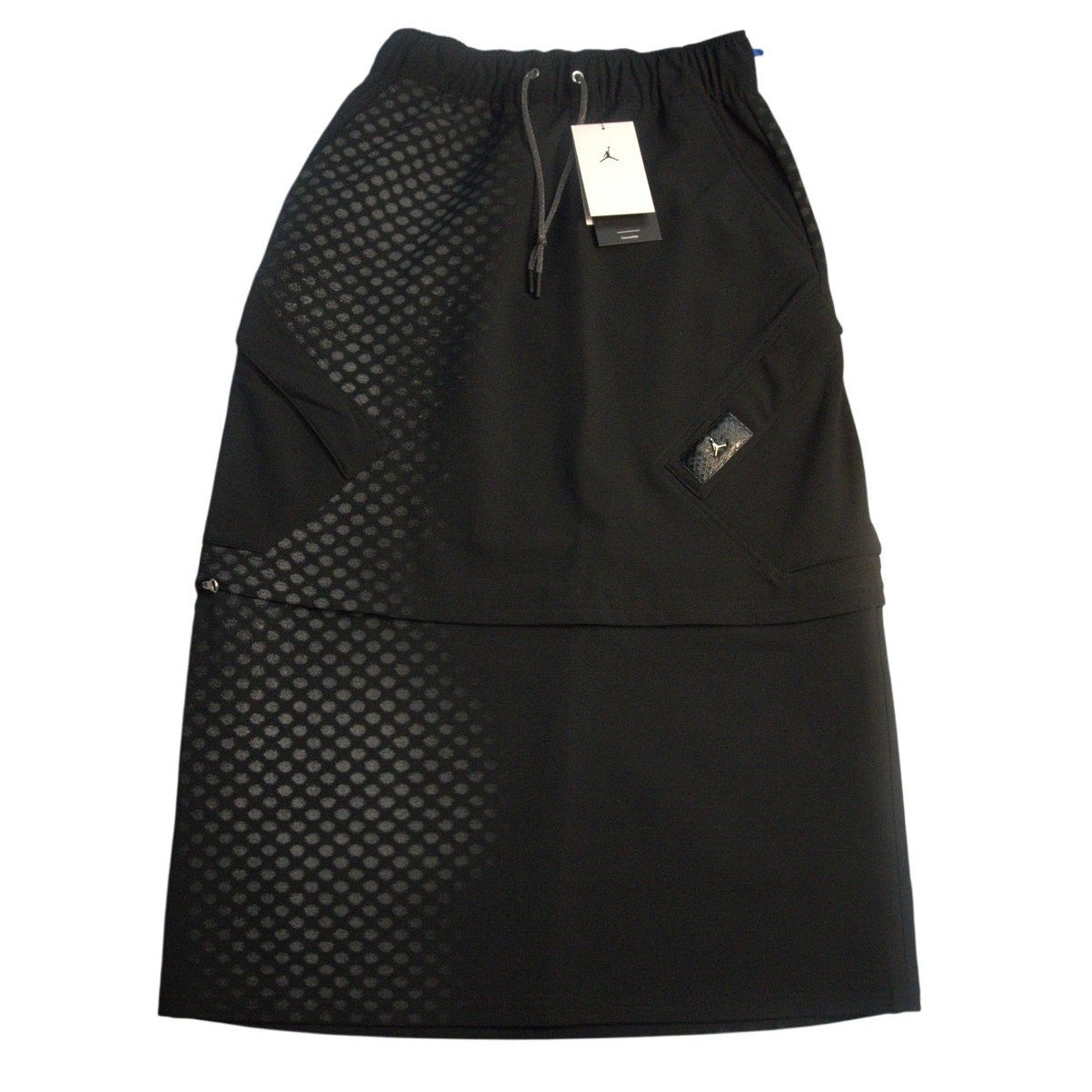 Black Nike Air Jordan women's convertible skirt, mid/full length, featuring sporty design and comfortable fit.