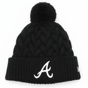 New Era women's Atlanta Braves knit beanie in black with pom, featuring team logo and cozy knit fabric.