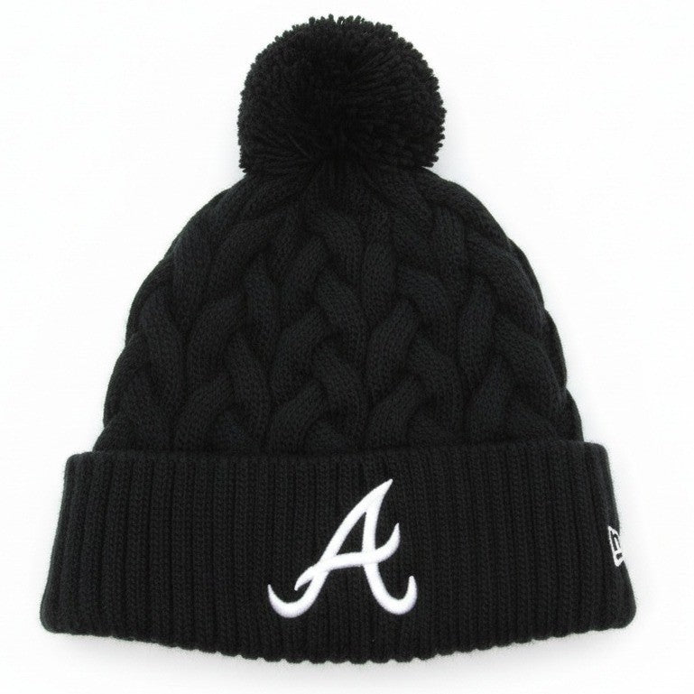 New Era women's Atlanta Braves knit beanie in black with pom, featuring team logo and cozy knit fabric.