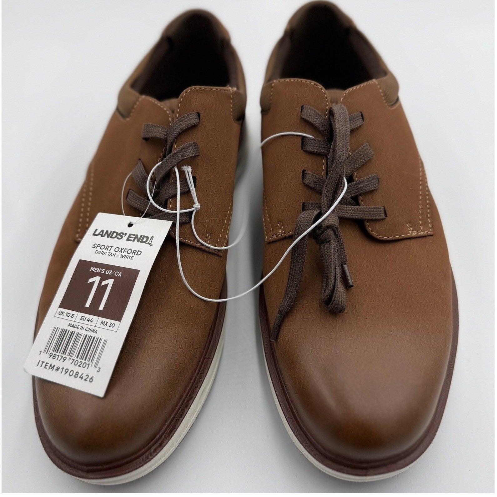 Lands' End men's Sport Oxford flats in dark tan and white, size 11, showing a close-up of the stylish leather shoes.