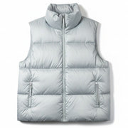 Vuori women's Hillside down vest with 100% duck down insulation, lightweight, puffy outdoor vest in a neutral color.