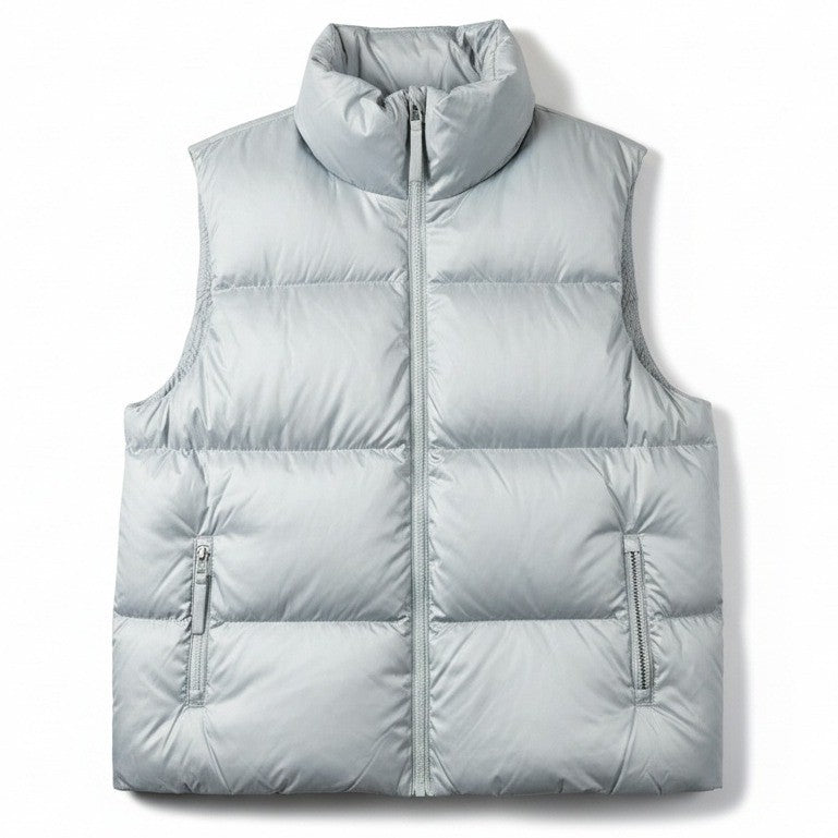 Vuori women's Hillside down vest with 100% duck down insulation, lightweight, puffy outdoor vest in a neutral color.