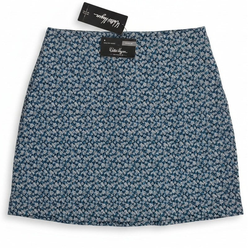 Walter Hagen P11 Sculpt Skort in Dogwood Ditsy print, women's small size, showing the 17-inch golf skort with floral pattern.