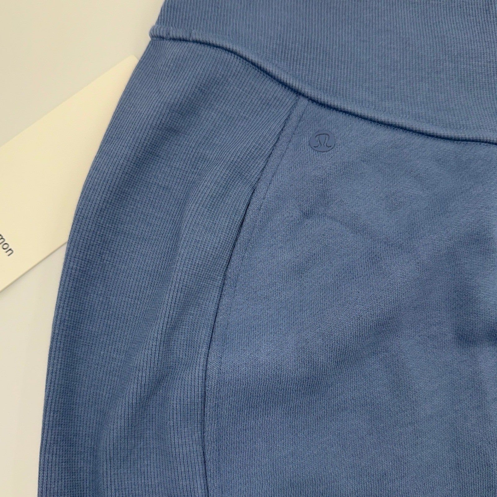 Lululemon NWT Scuba HR Mini Skirt for women, small high-rise stretch athleisure skirt, shown in a natural pose.