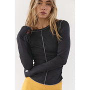 Women's Free People long sleeve T-shirt from the Right on Run Layer collection, shown in a relaxed fit with soft fabric.