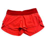 Lululemon Speed 2.5-inch vibrant coral women's running shorts, size 6, lightweight athletic shorts with a sleek fit.