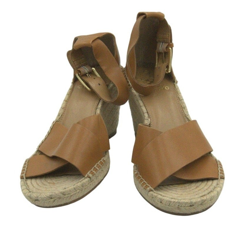 Vince Camuto women's tan espadrille wedge sandals size 8.5 with braided jute heel and ankle straps on a neutral background.