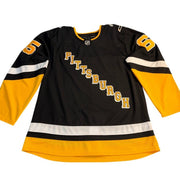 NWOT Erik Karlsson Penguins Fanatics NHL jersey, size US 56, featuring team logo and player number 65 on the front.