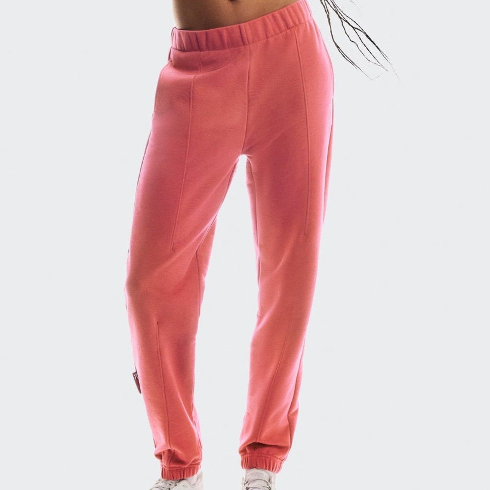 On Cloud women's coral joggers, athletic club pants with a relaxed fit, casual athleisure style, size XL.