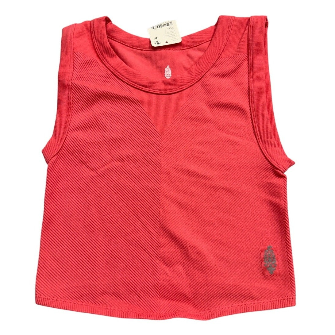 NWT Fp Movement coral pink ribbed cropped tank top in XS/S, lightweight performance top with fitted design and textured fabric.
