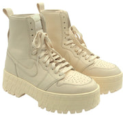 Women's Air Jordan Brooklyn Platform Combat Boots, size 12, featuring rugged design and bold black and white color scheme.