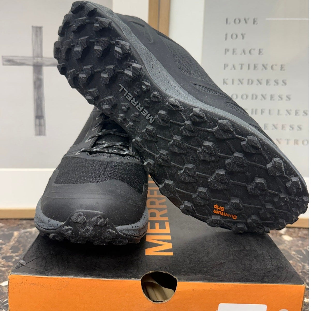 Men's Merrell Altalight Trail Running Shoes in black and rock color, showing the lightweight design and rugged outsole.