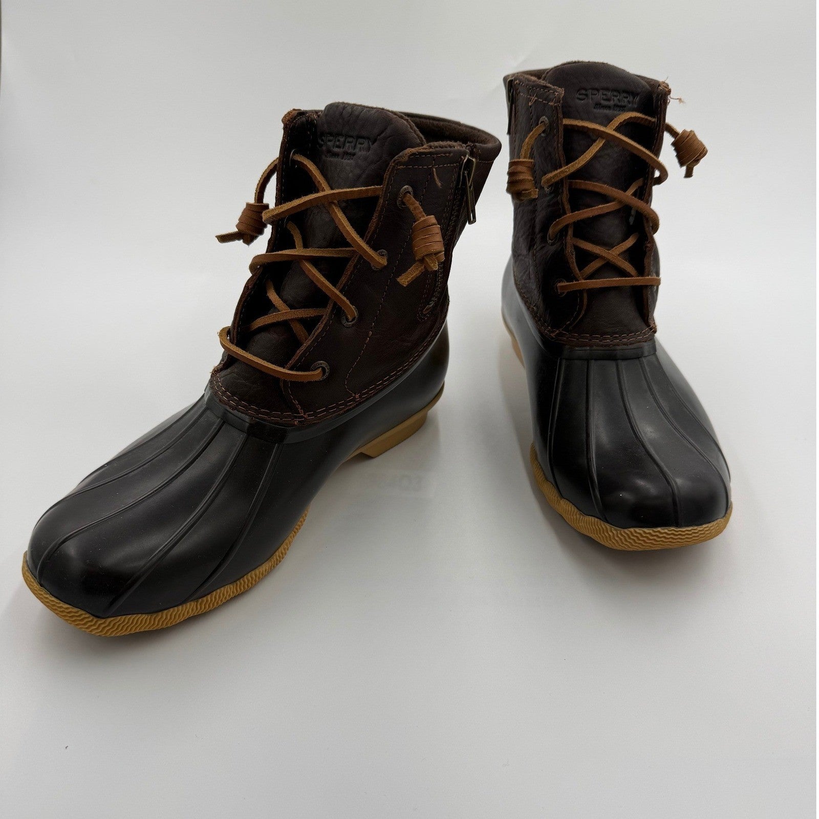 Women's Sperry Top-Sider Saltwater Duck Boots in brown with waterproof design, size 9.5, showing the rugged exterior and laces.