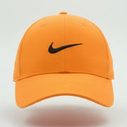 Nike Club Cap in neon orange (Papaya), unisex adjustable hat with Nike logo, perfect for casual wear and sun protection.