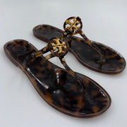 Tory Burch Mini Miller sandals in tortoise shell jelly, women's size 8, featuring a sleek strap design and glossy finish.