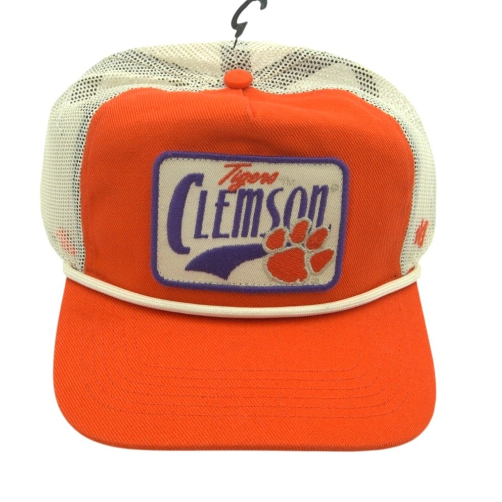 Orange and cream Clemson Tigers trucker hat by 47 Brand, featuring mesh back and adjustable snap closure, one size fits most.