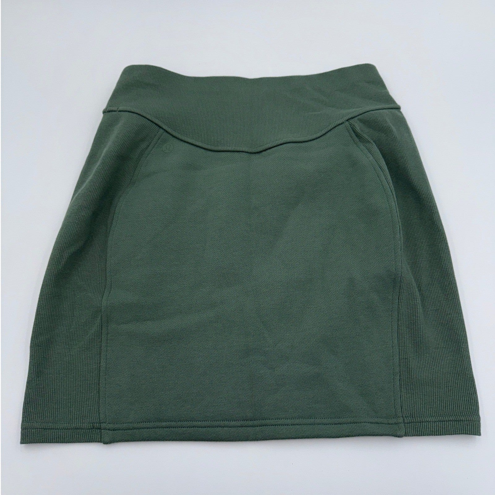 Lululemon Scuba HR Mini Skirt for women in small size, high-rise stretch athleisure skirt with a sleek, fitted design.