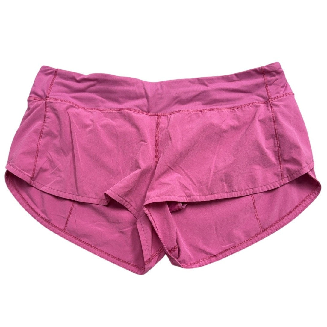 Lululemon Women's Hotty Hot Shorts in size 8, lightweight athletic shorts with a snug fit and vibrant color for active wear.