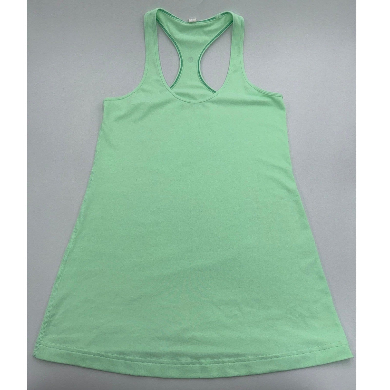 Lululemon Cool Racerback short tank top for women, lightweight athletic tank with racerback design and breathable fabric.