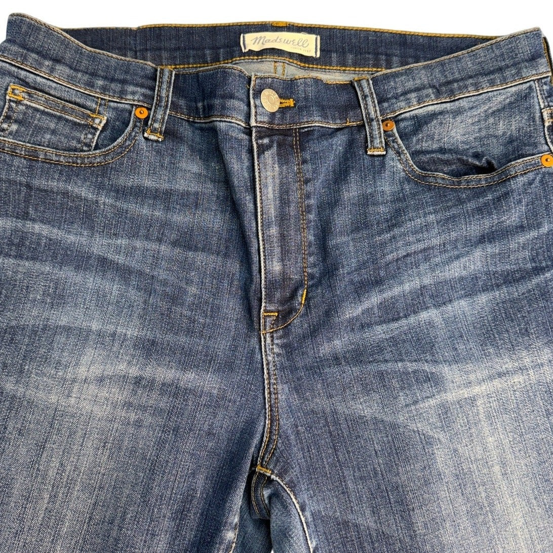 Madewell high riser skinny jeans for women, size 32, in great condition, shown on a hanger with a close-up of denim fabric.