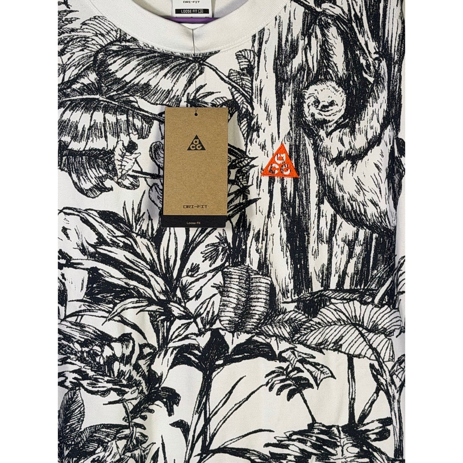 Nike ACG men's Jungle Animal Graphic Dri-FIT T-shirt, small size, featuring a vibrant jungle animal print on the front.