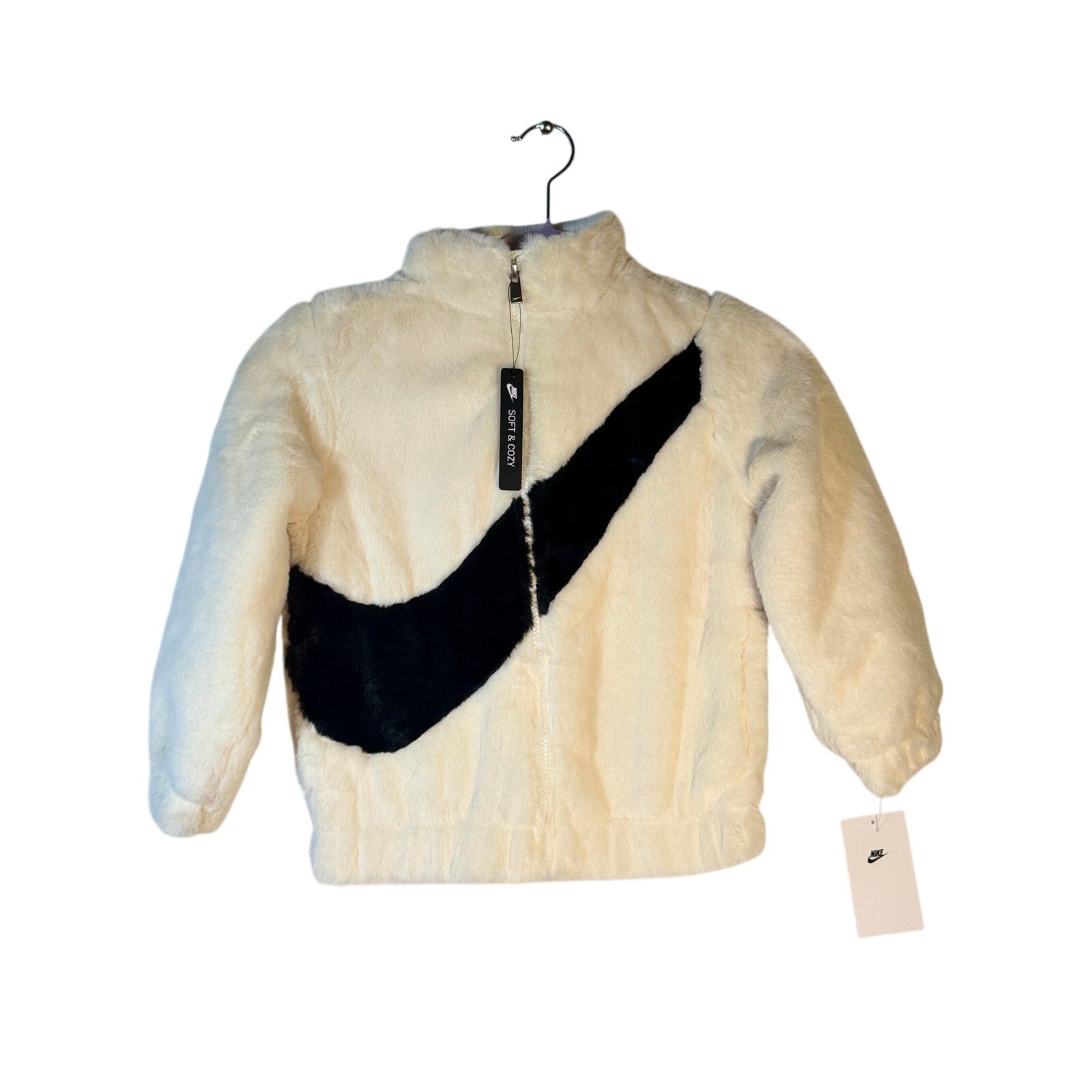 Nike girls' white faux fur Swoosh jacket, size 6, full zip, stylish and cozy, featuring Nike branding and a plush fur collar.