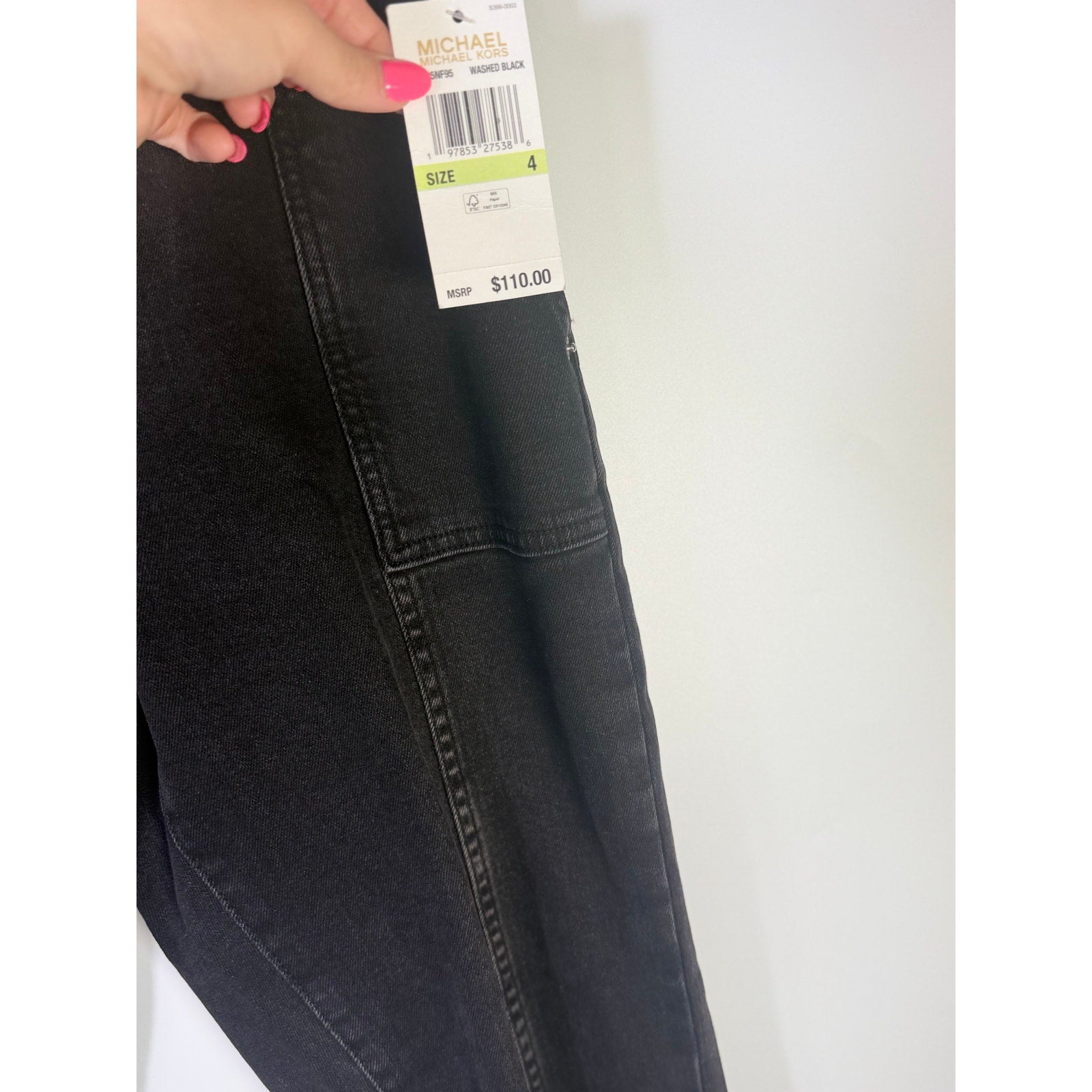 MICHAEL Michael Kors women's Selma cropped flare jeans in washed black, size 4, with a fitted waist and flared leg style.