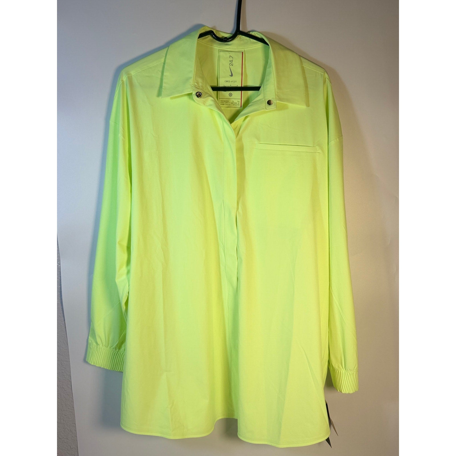 Nike 24.7 Dri-FIT women's training shirt dress in volt green, large size, featuring Nike branding and athletic fit.