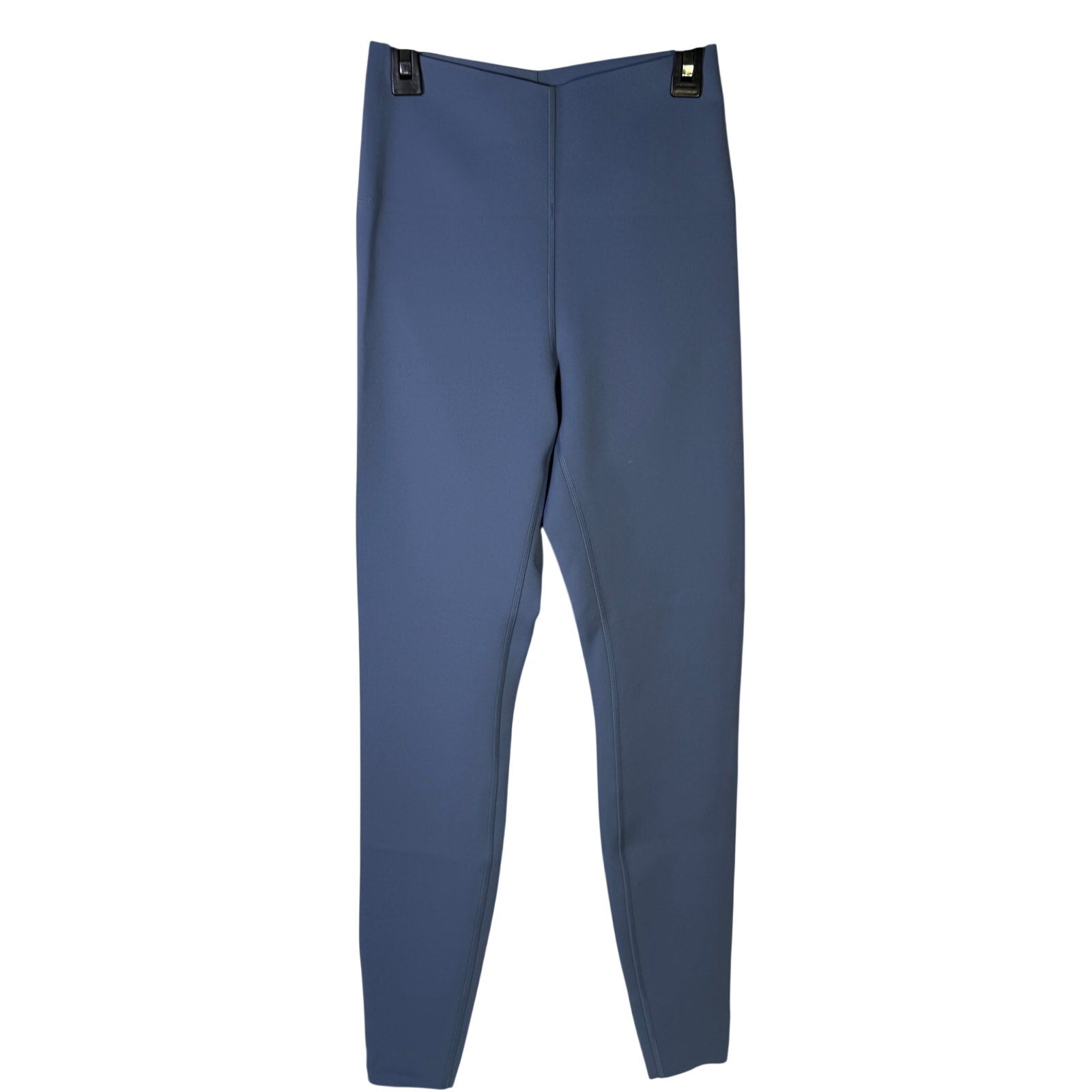 Lululemon Glow Up high-rise denim leggings in size 6, washed blue color, showcasing the fitted, stretchy fabric and high waistband.
