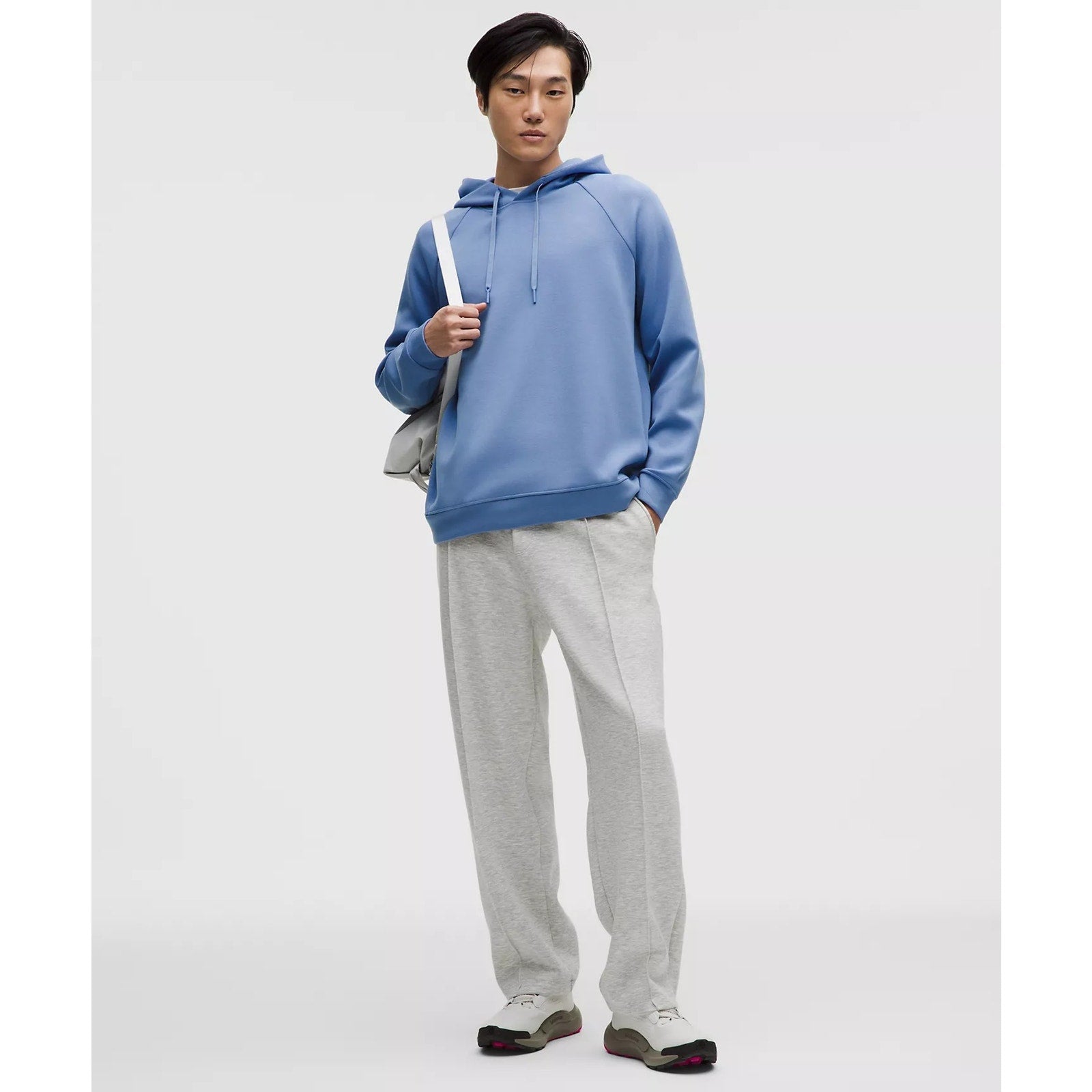 Men's blue Lululemon Smooth Spacer Pullover Hoodie, size XL, shown with a relaxed fit and soft fabric texture.
